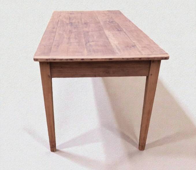 Old farmhouse table with two drawers.