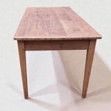 Old farmhouse table with two drawers.