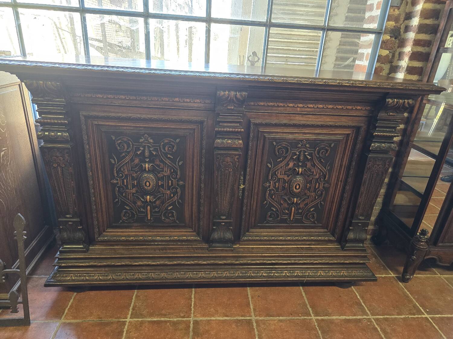 Renaissance style 2-door walnut sideboard