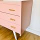 1950s pink and gold chest of drawers