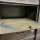Industrial cladding furniture in brushed and patinated steel