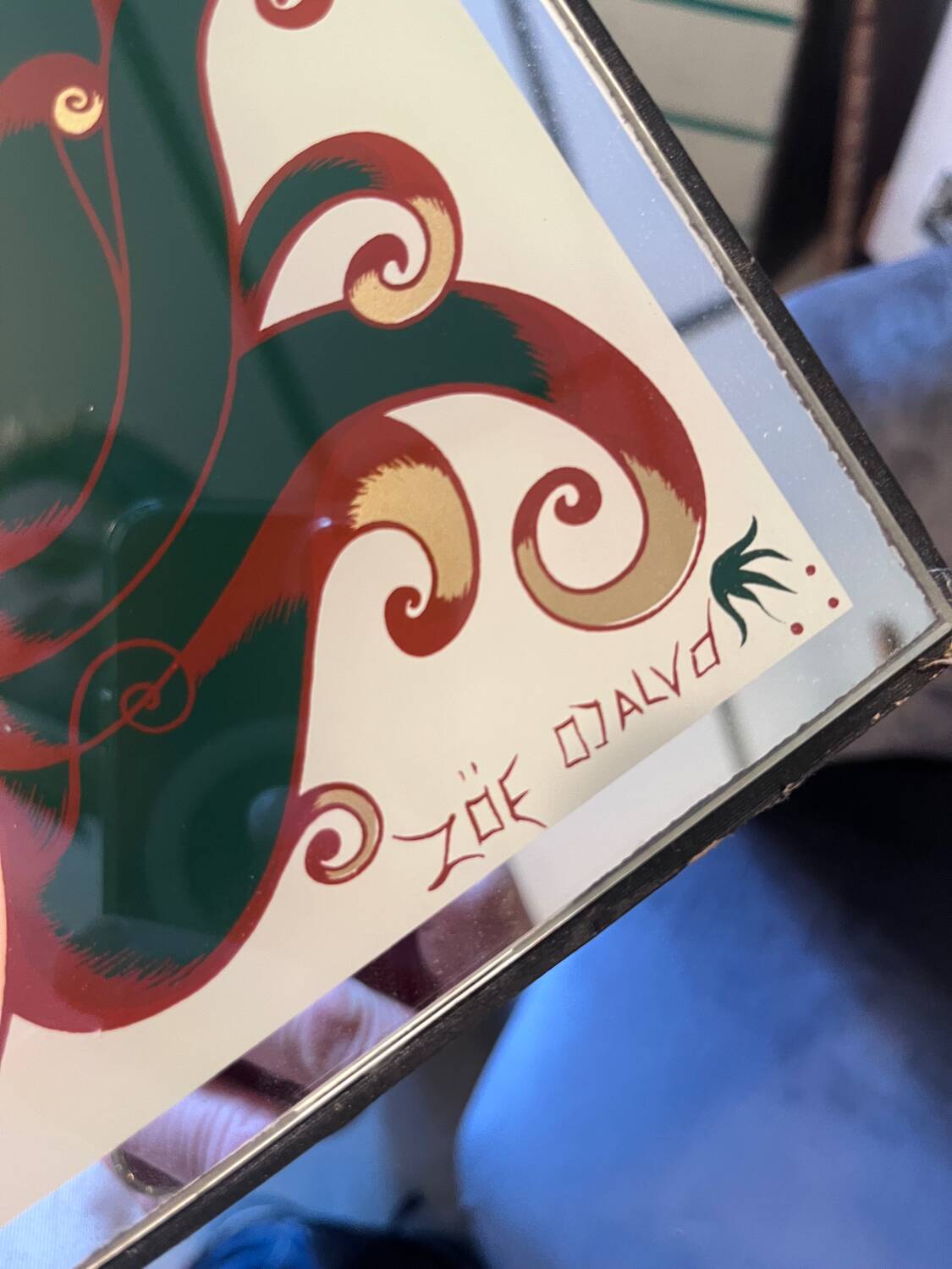 Art Deco style glass mirror, decorated upside down with nude women, signed