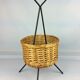 Black metal rattan trash can on 1960