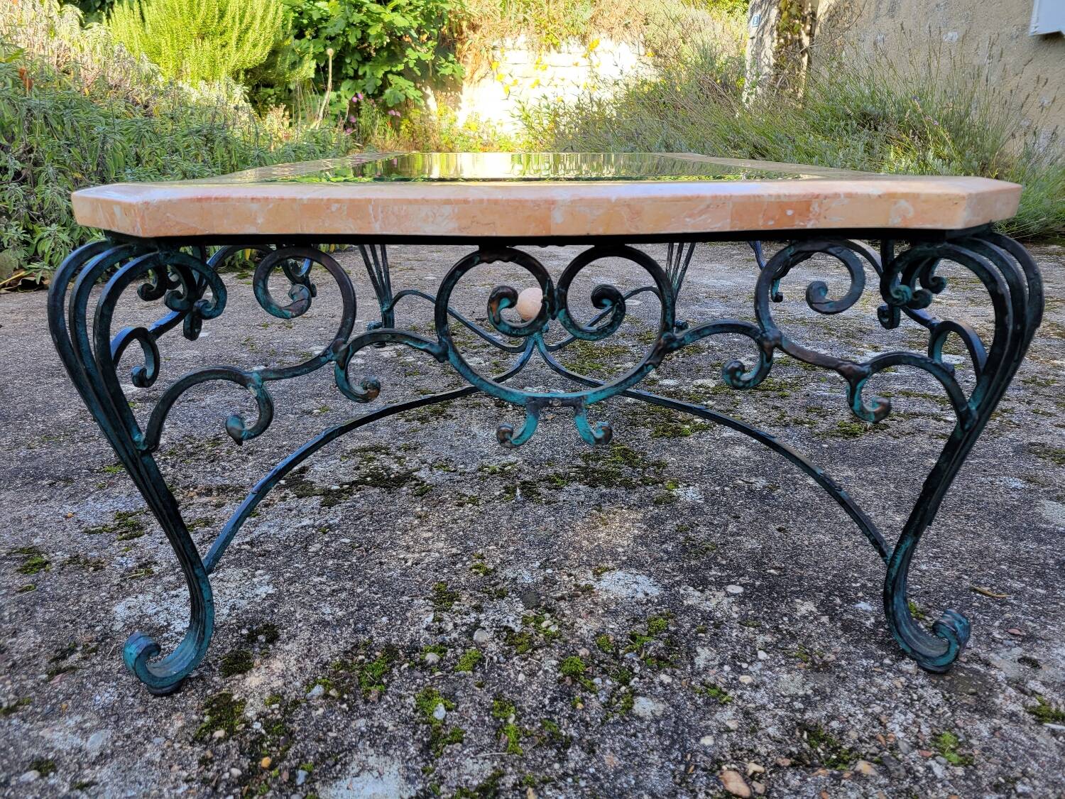 Pink marble and wrought iron coffee table