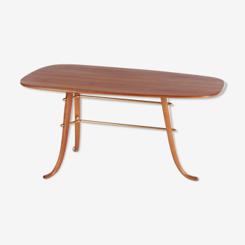 Vintage coffee table with 3 legs and brass details Scandinavia.