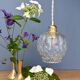 Suspension globe vintage en verre moulé transparent