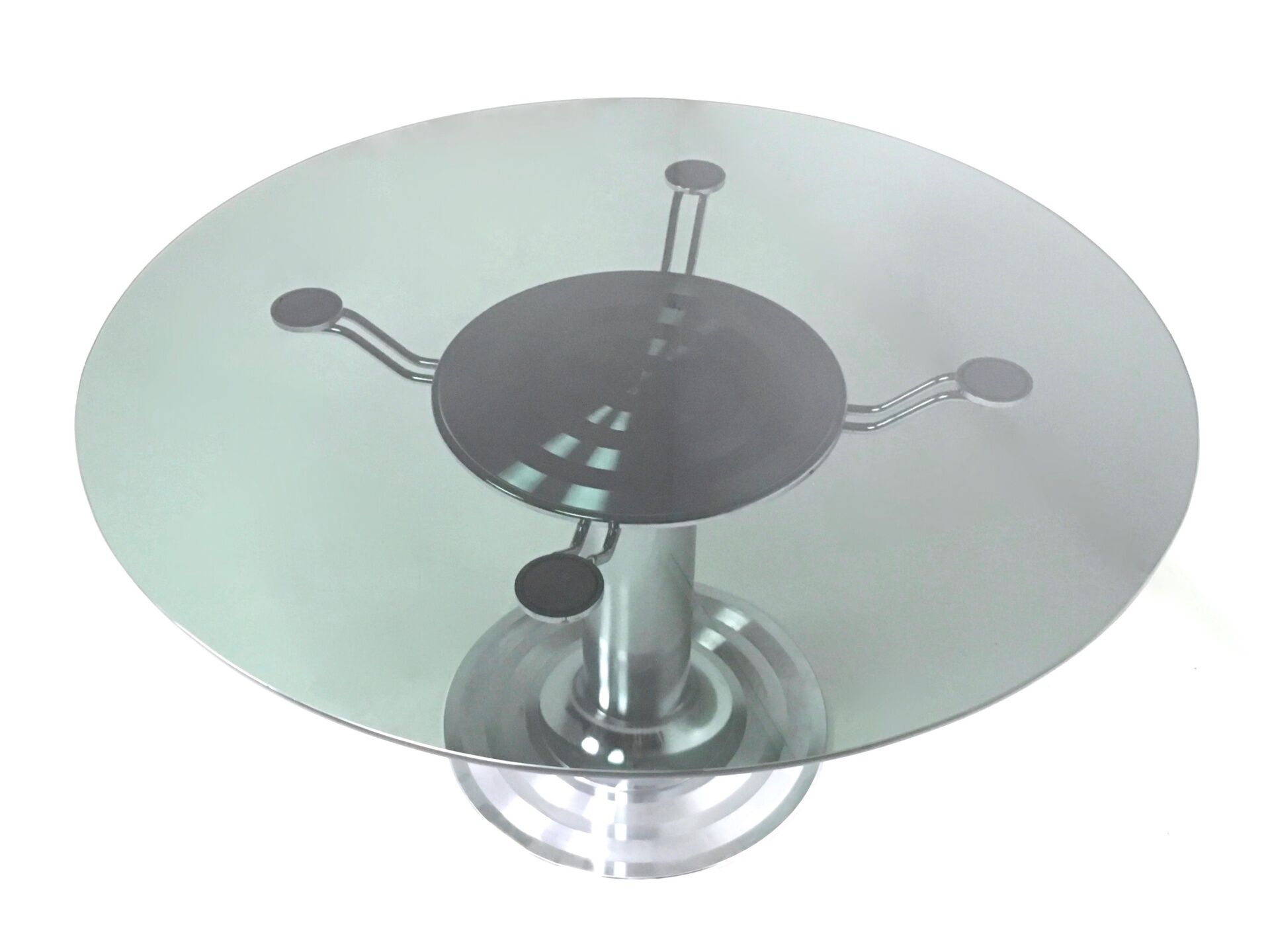 Postmodern chromed metal dining table with a round tempered glass top, italy