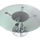 Postmodern chromed metal dining table with a round tempered glass top, italy