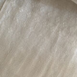 Old white cotton tablecloth.