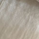 Old white cotton tablecloth.