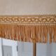 Authentic antique lamppost in gilded brass lampshade in fringed cream fabric