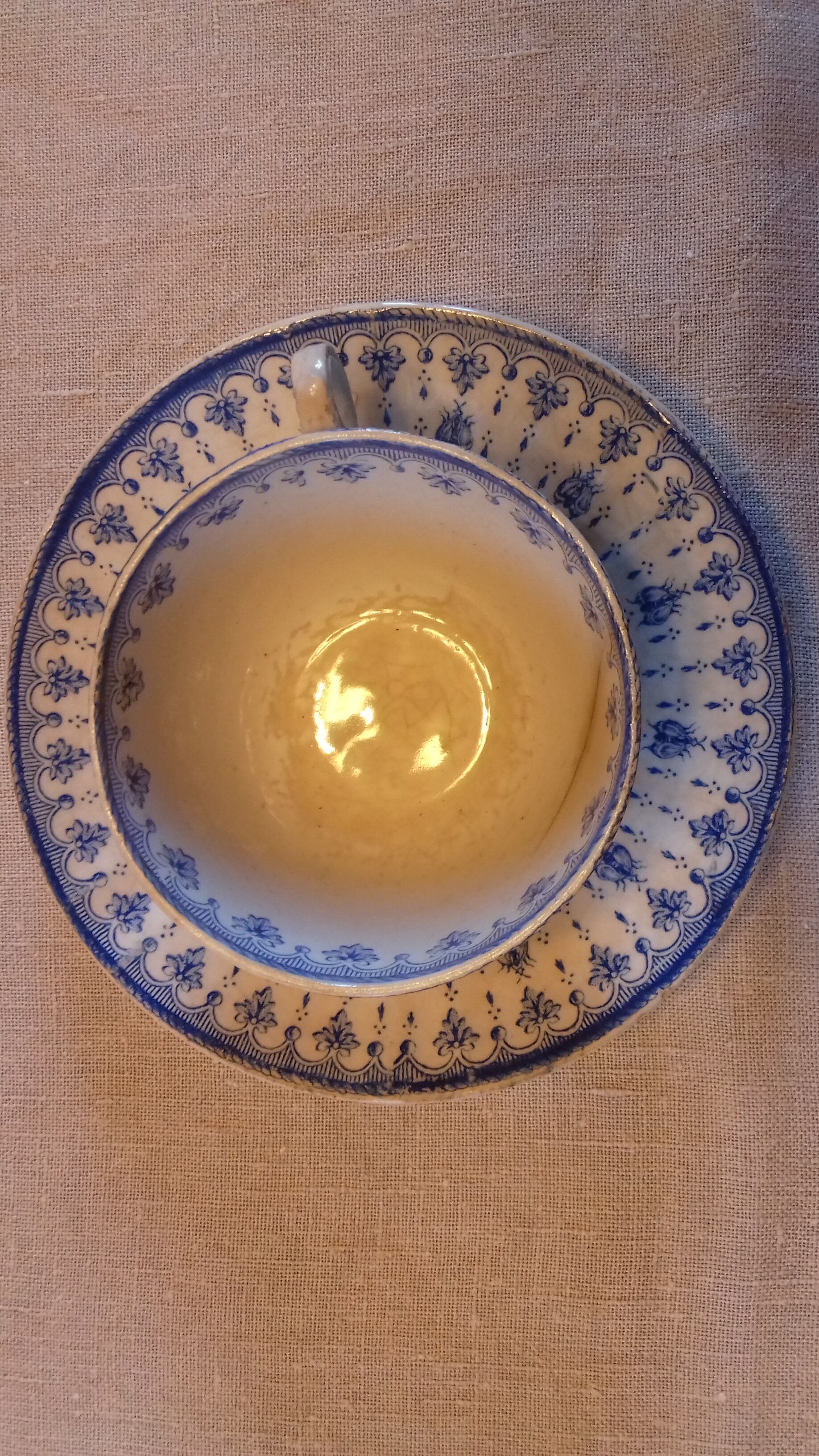2 old coffee cups with their saucer, with blue bee patterns