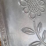 Pair of embossed flower paintings
