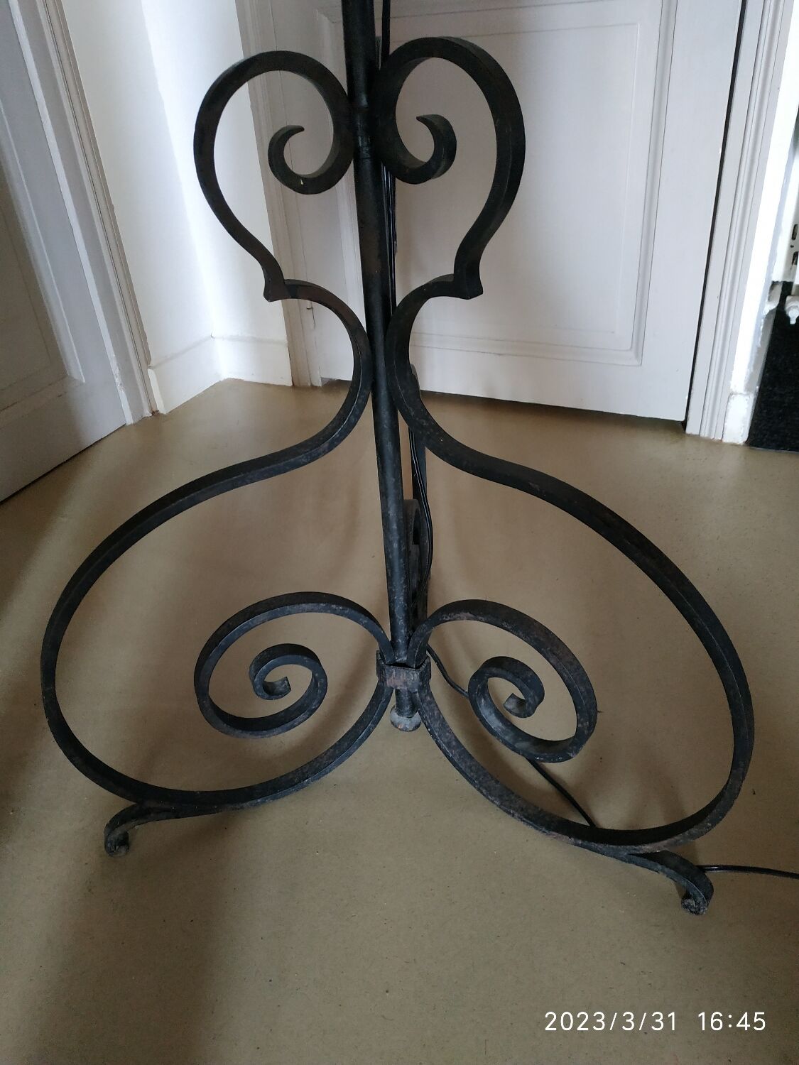 Black wrought iron floor lamp
