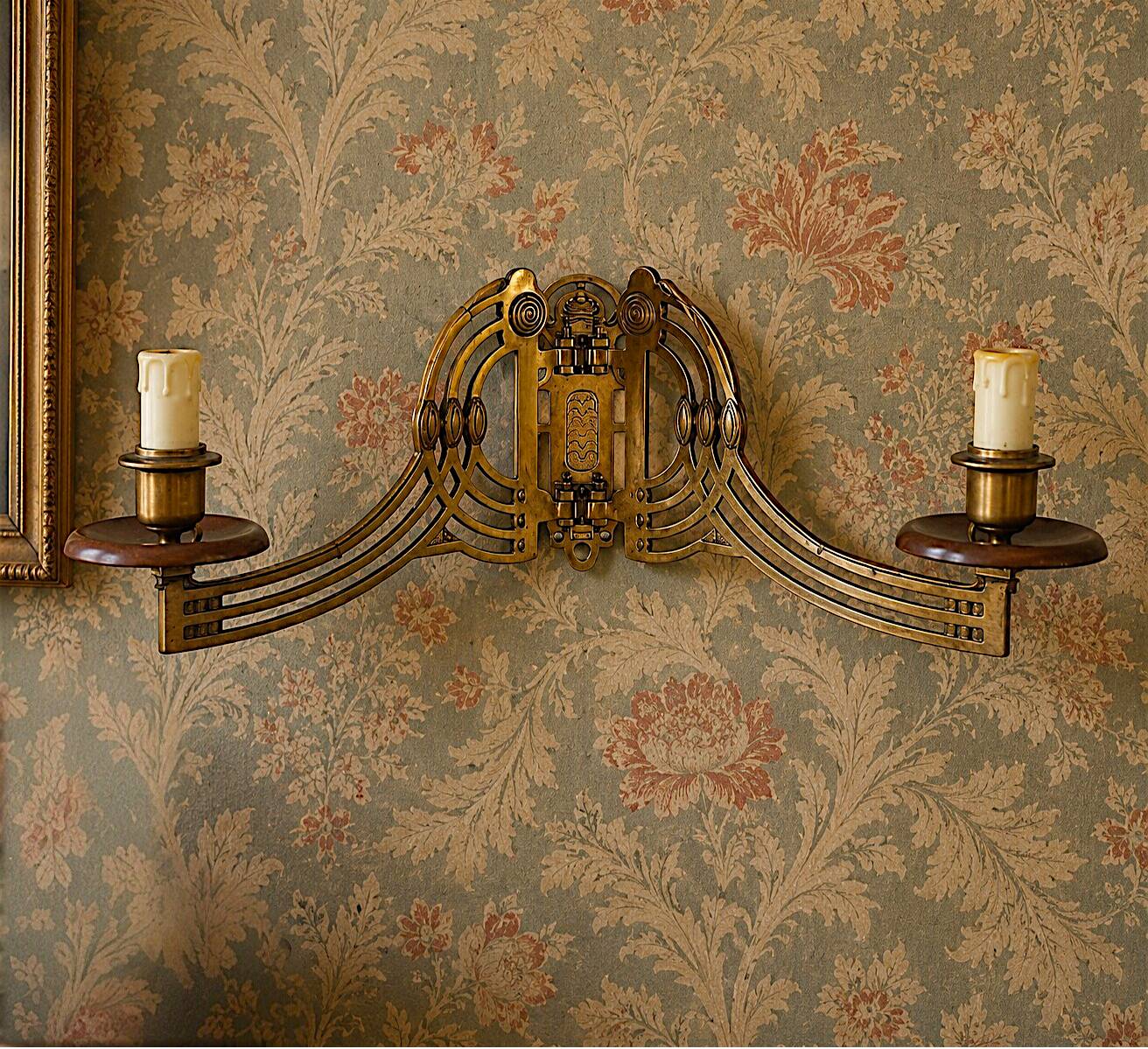 Art Nouveau style brass double piano wall lamp