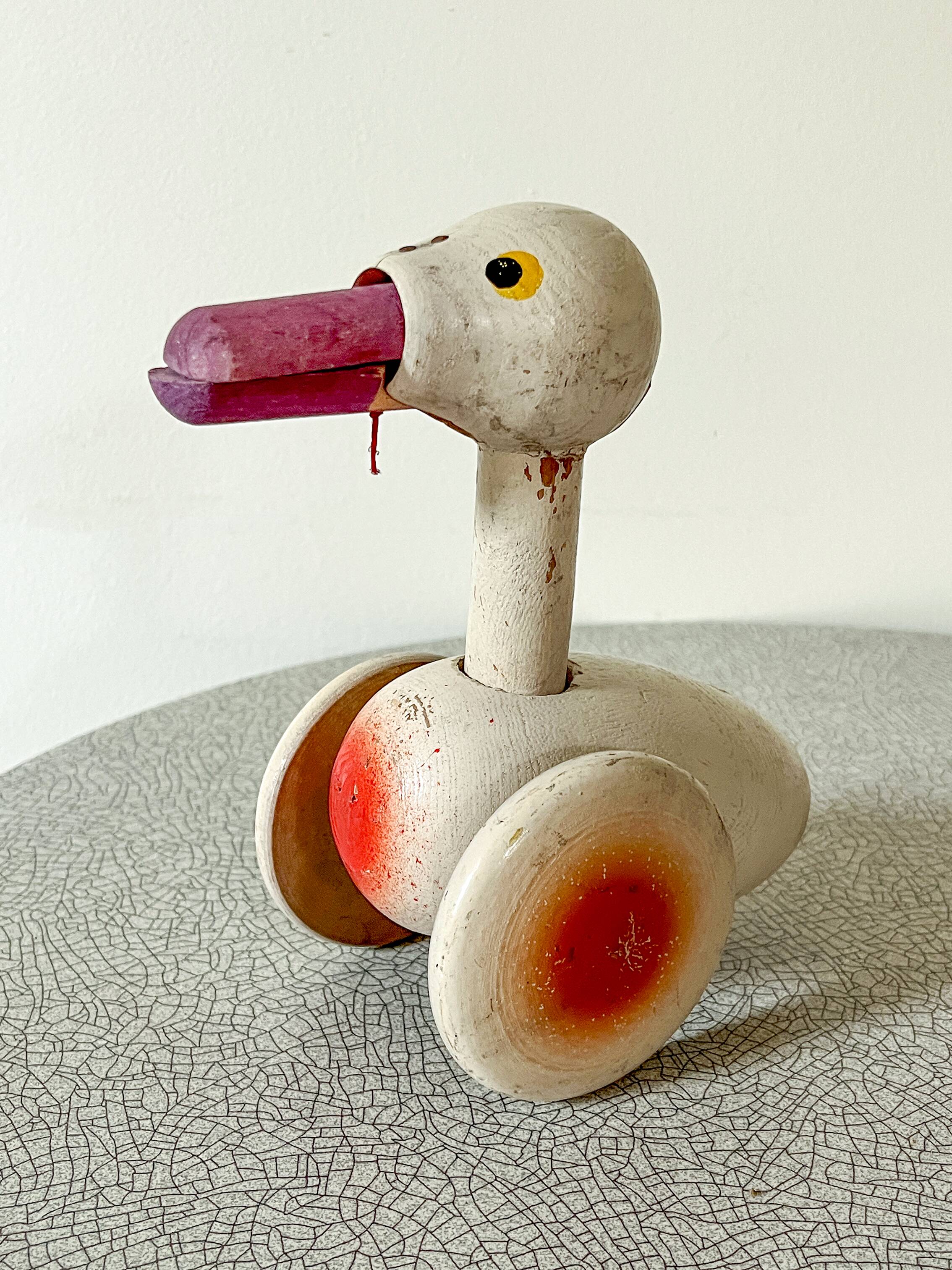 Old push toy, wooden duck