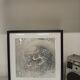 a Kinetic Op Art Aluchromy under glass frame.