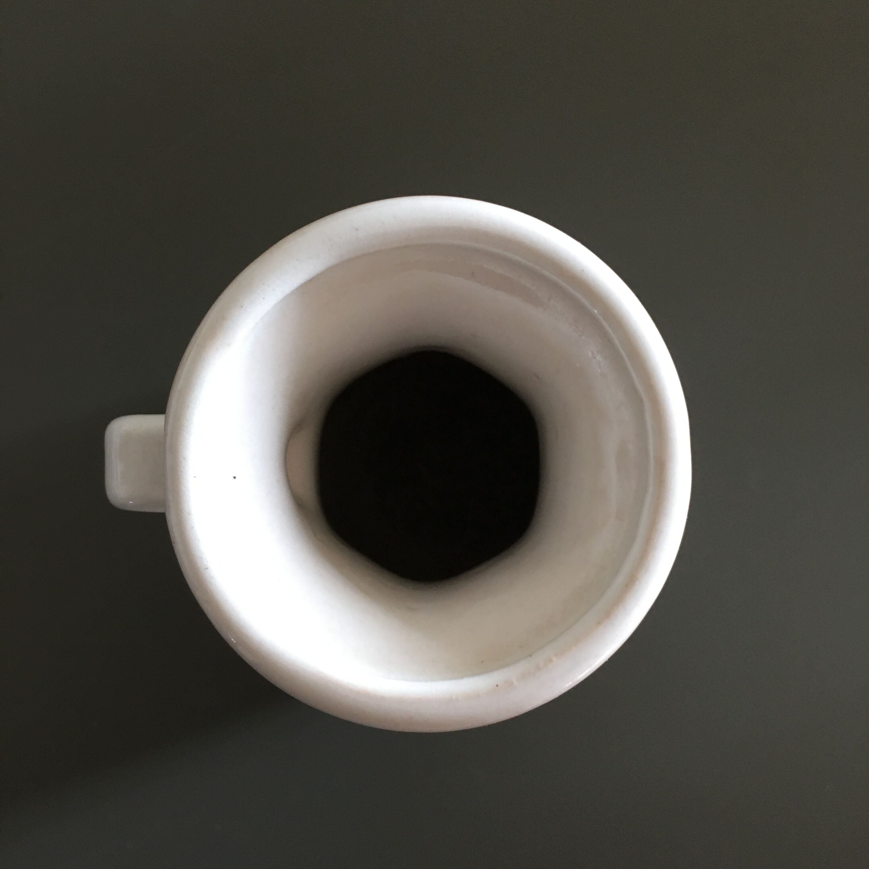 Ivory vase with handle