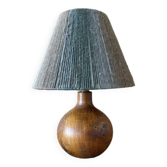 Old turned wooden lamp