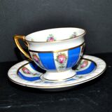 Maria collector's cup in blue and gold German porcelain.