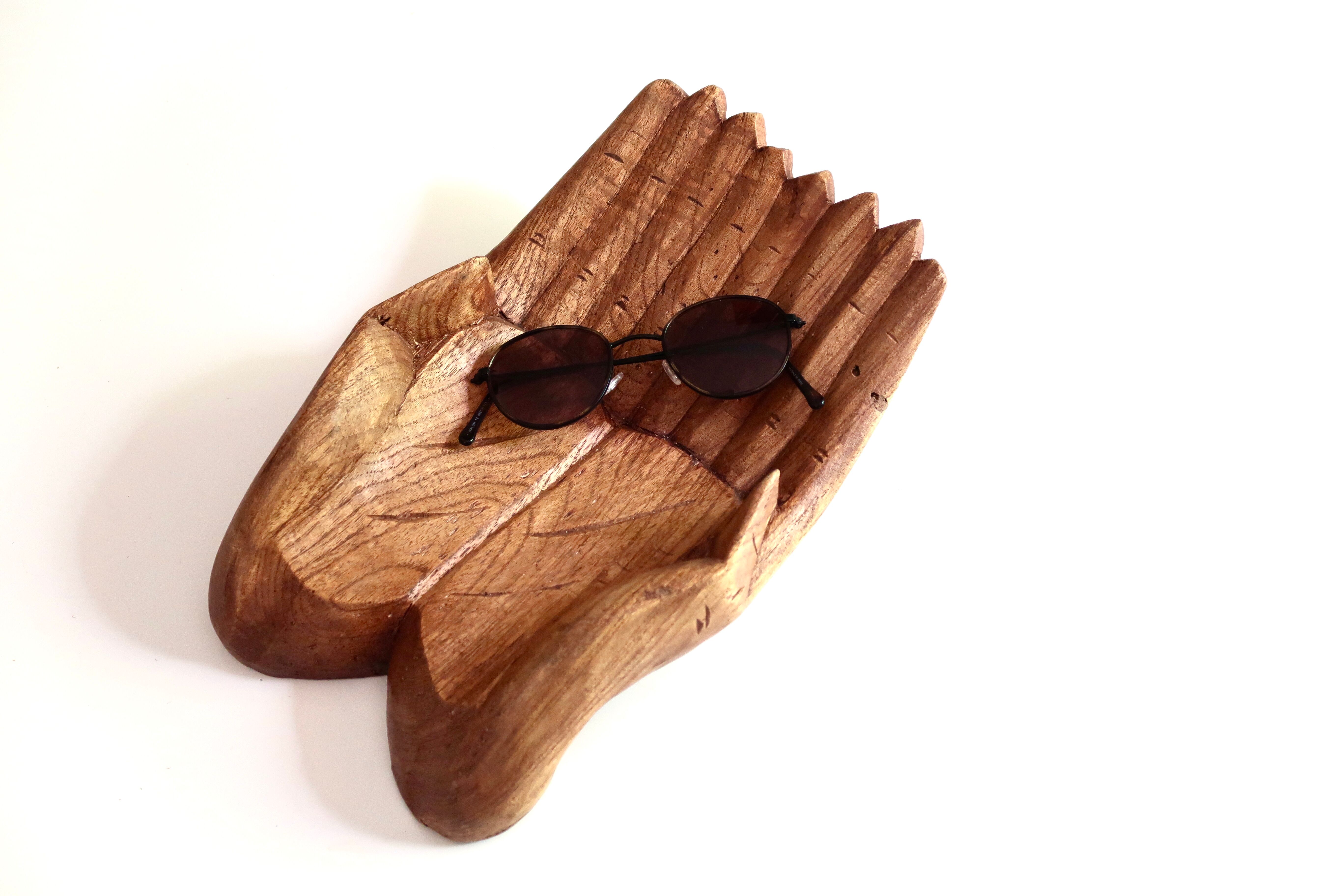 Empty pocket, hands joined in carved wood, 70s