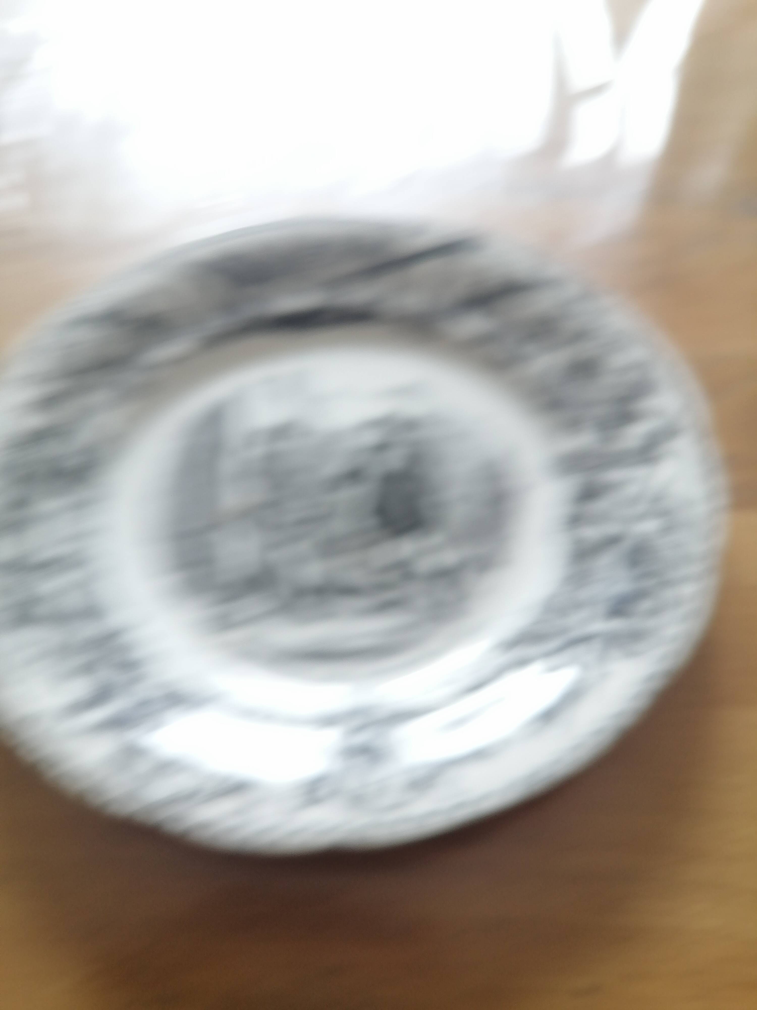 Set of eight talking plates