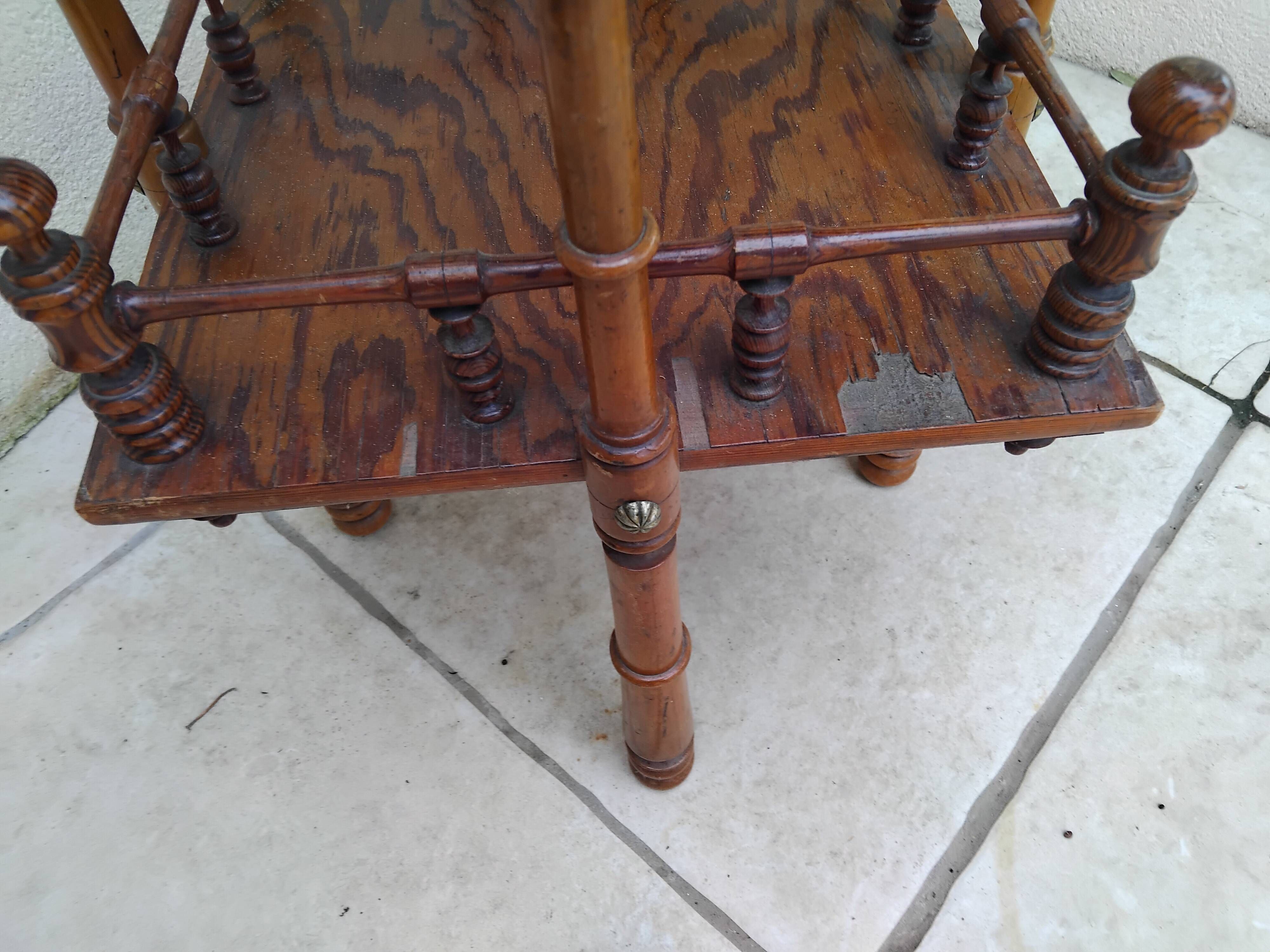 Antique pedestal table in Asian Japonese style.