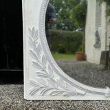 Louis XVI style fireplace mirror, carved wood trumeau with white and grey highlights, 18th century