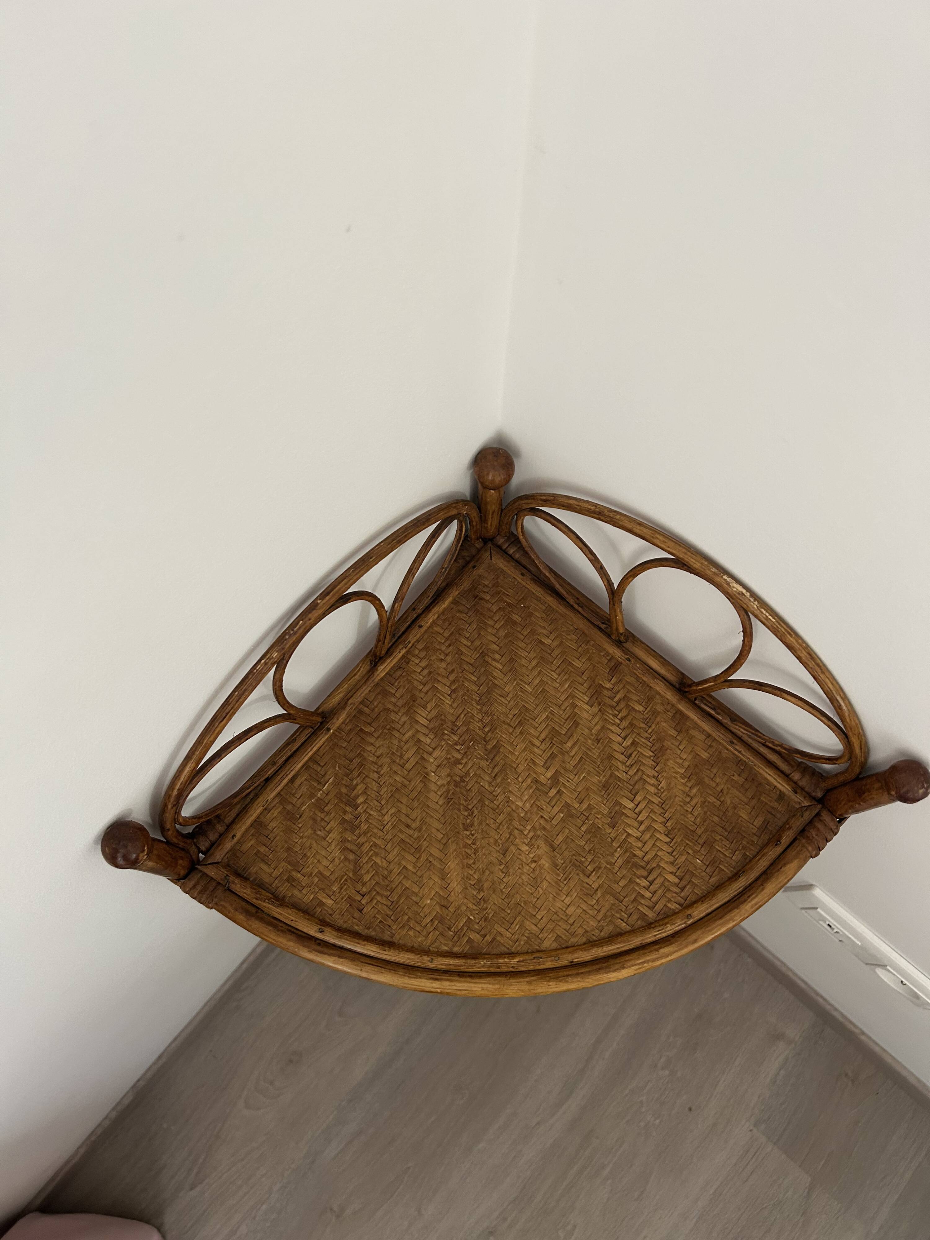 Corner bedside tables in rattan