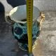 Trio of Vallauris vases in turquoise and black, highlighted with gold, 22 cm high