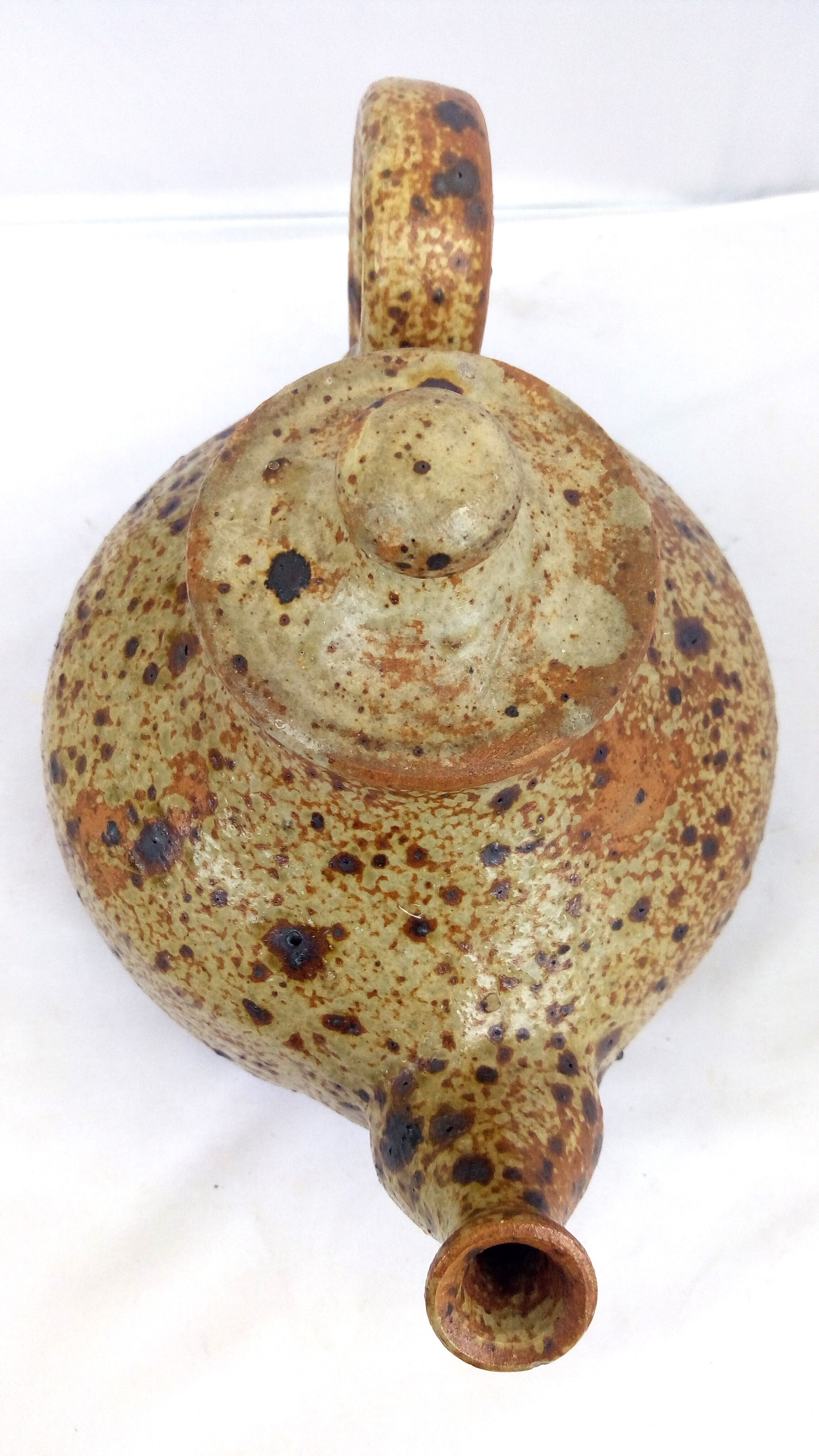 Rustic teapot in pyrity sandstone