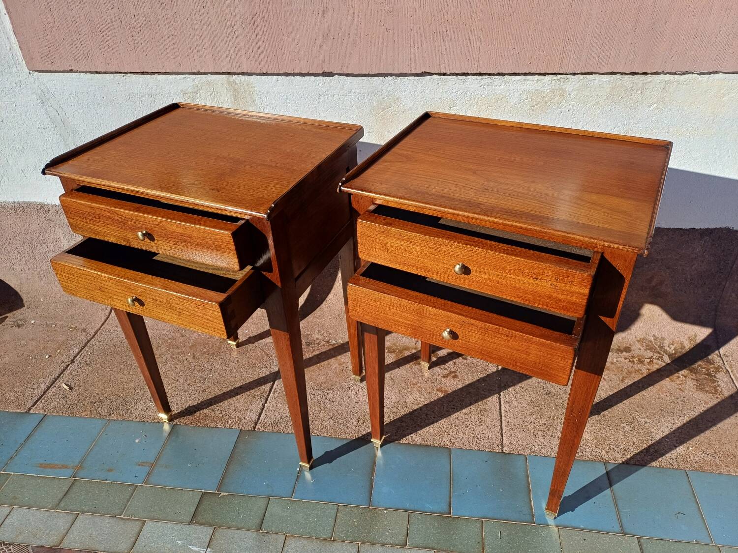Pair of Louis XVI style oak bedside tables with 2 drawers and spindle legs