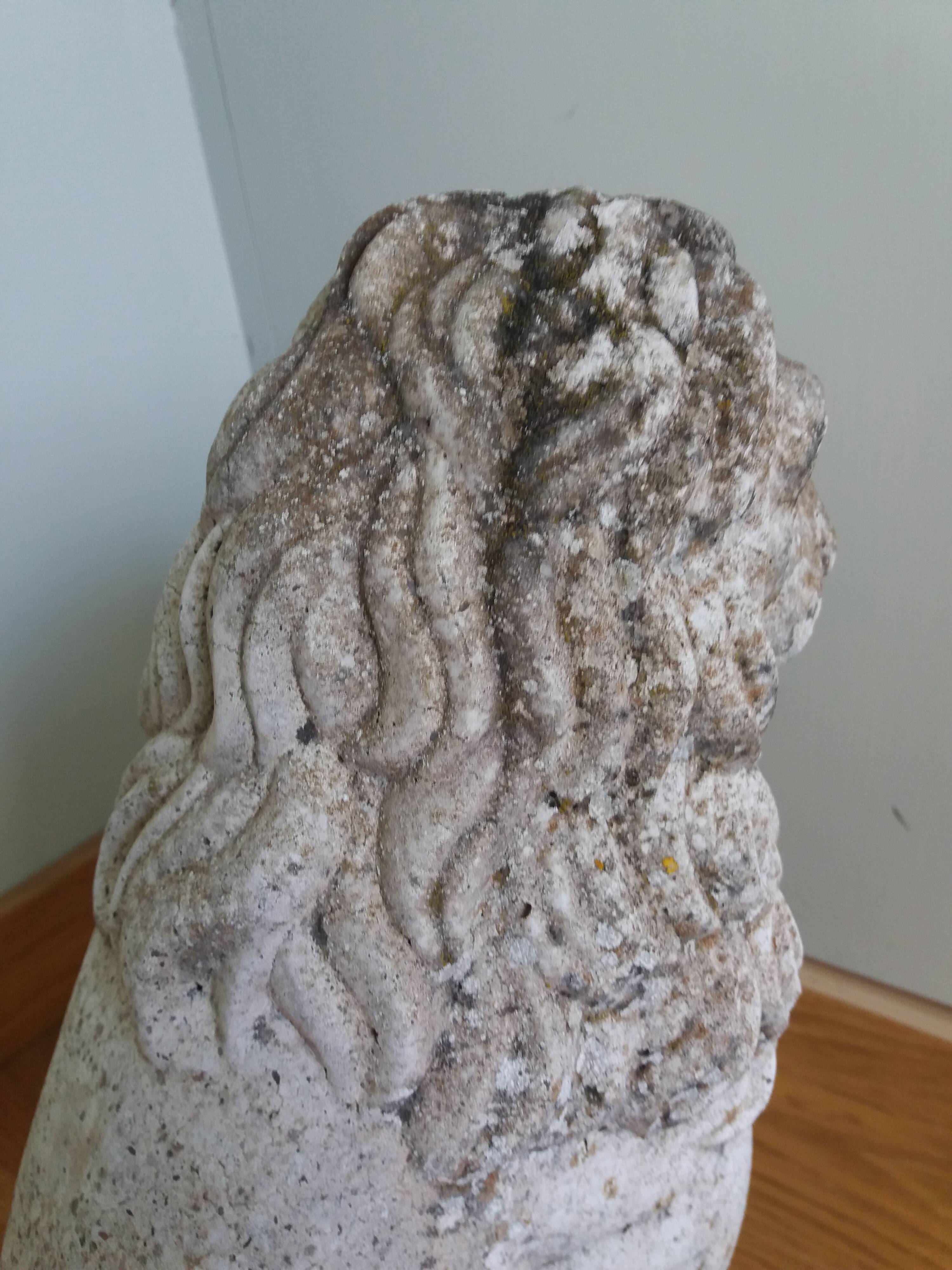 Lion garden statue in reconstituted stone