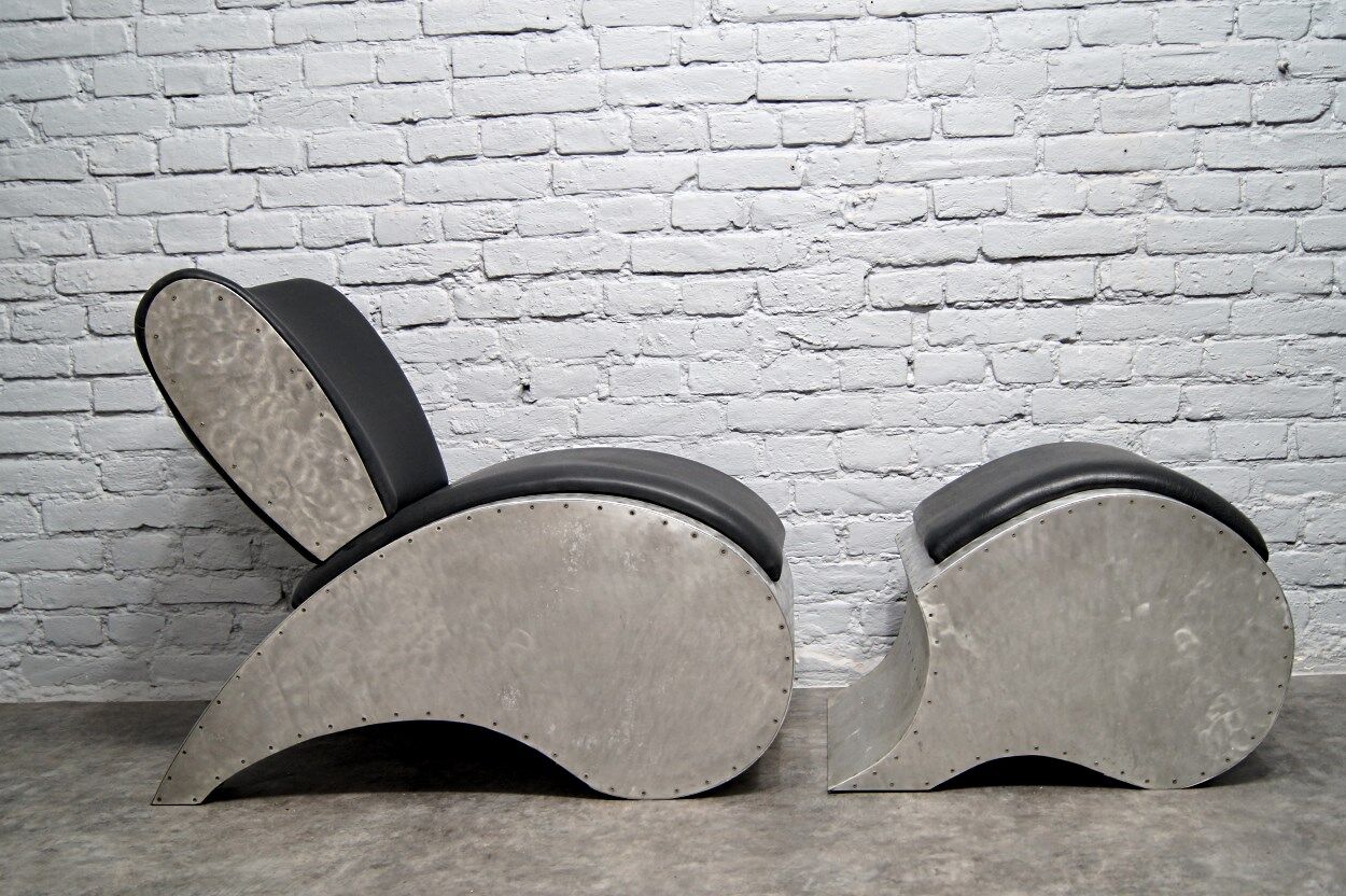Industrial aluminum & vinyl lounge chair with footrest, 1970s