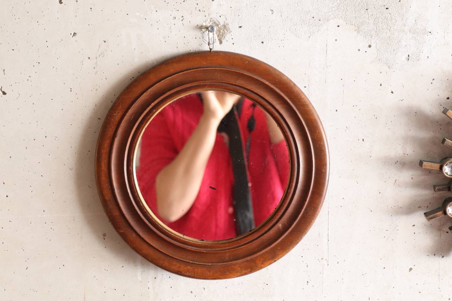 Round old wooden mirror