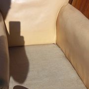 Pair of 1930s club armchairs in ivory leather.