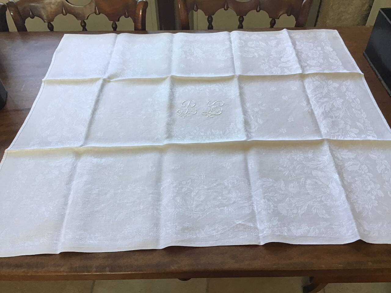 Set of 12 19th century white napkins marked “BL”