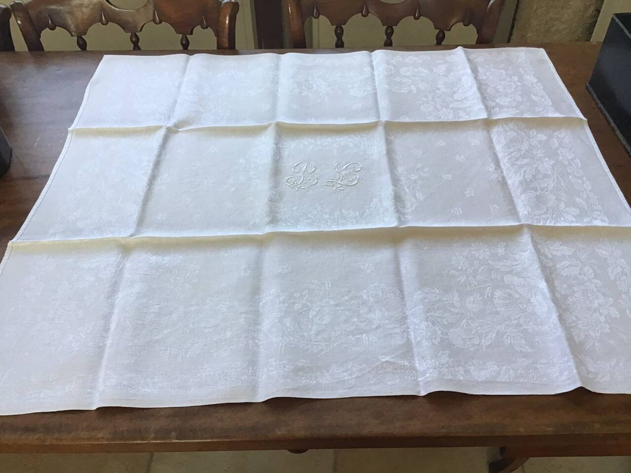 Set of 12 19th century white napkins marked “BL”
