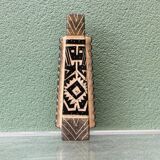 Modernist ceramic vase, signed, with incised geometric tribal decoration.