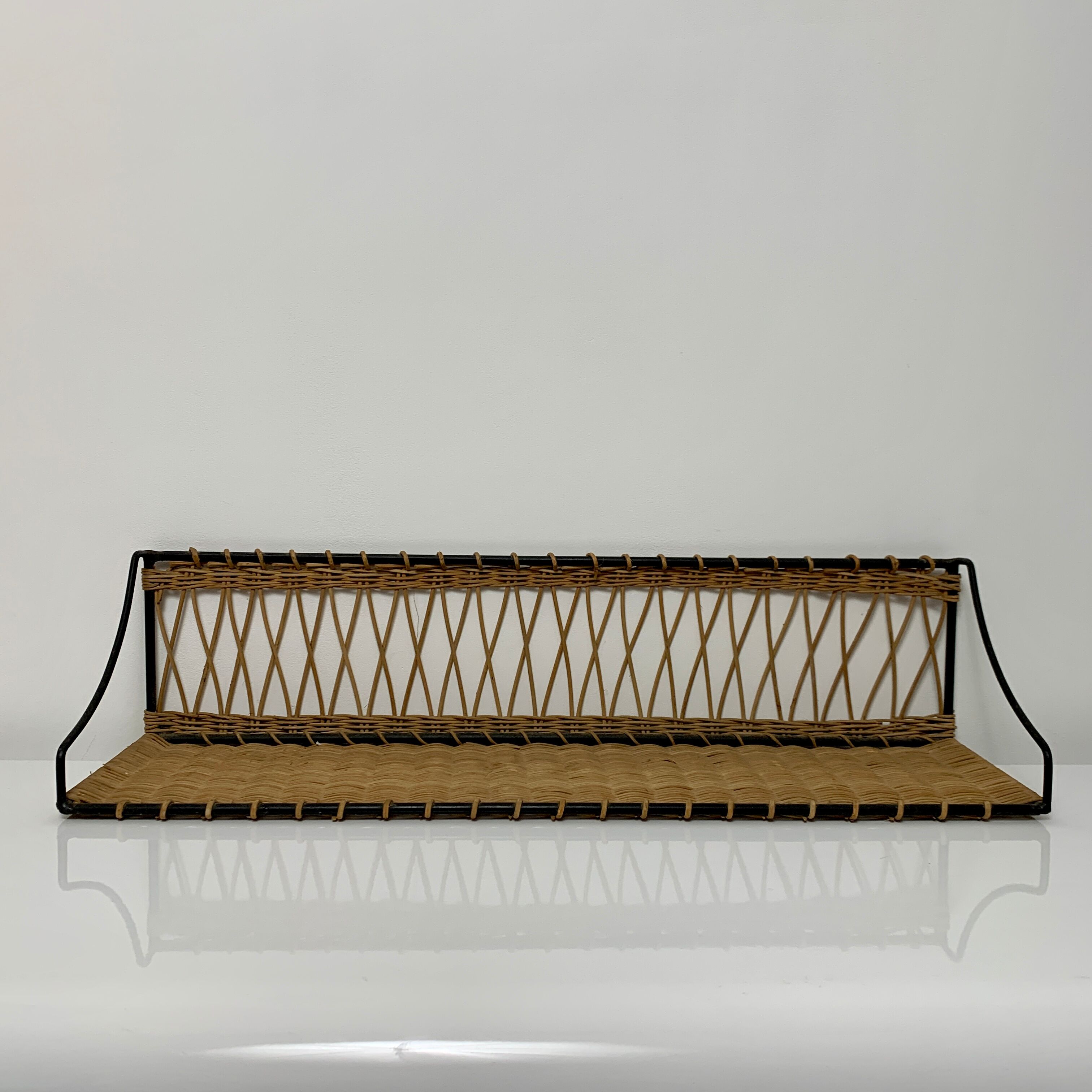 Wall floor in iron and rattan