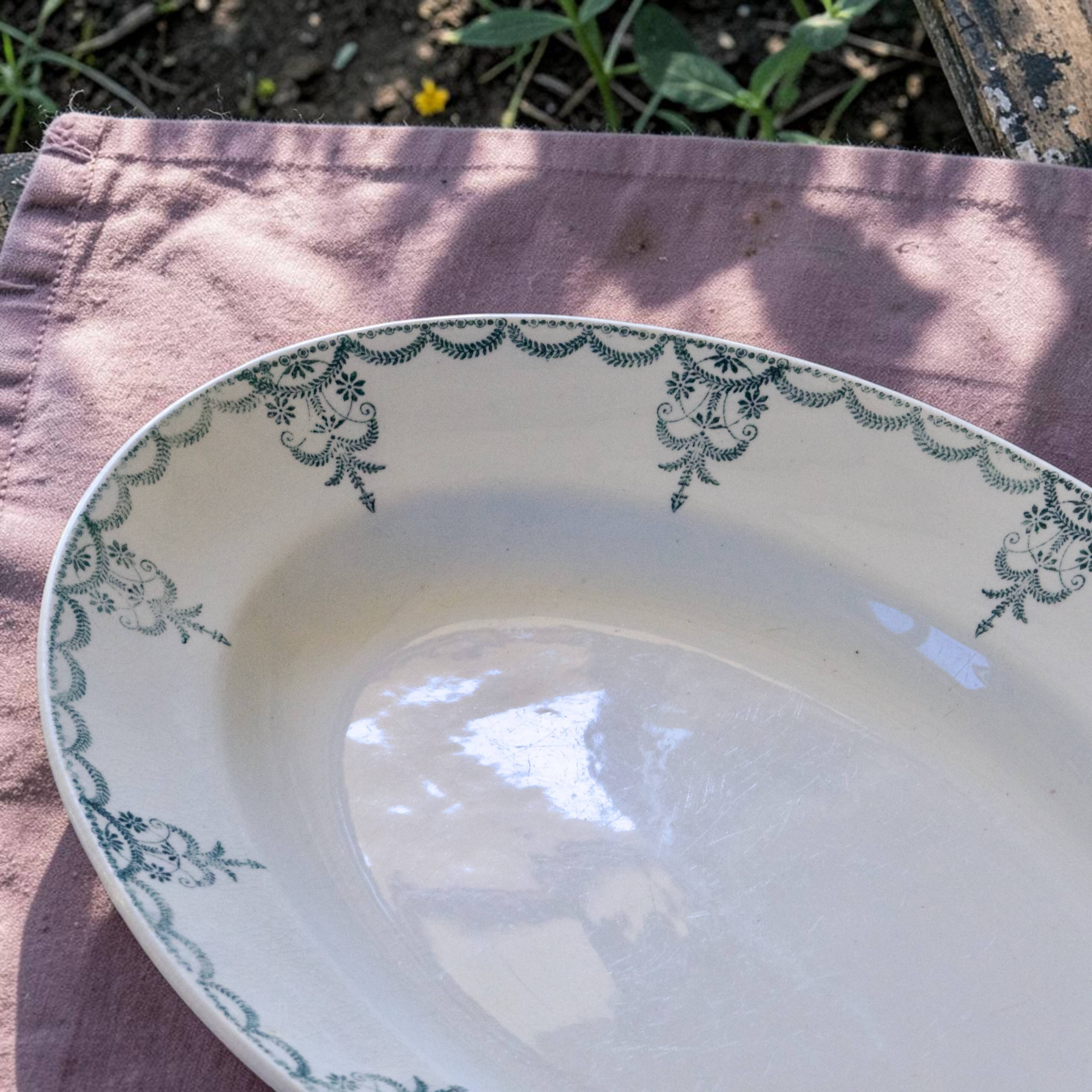 Large oval dish from the 19th century, ironstone, signed Moulin des Loups.