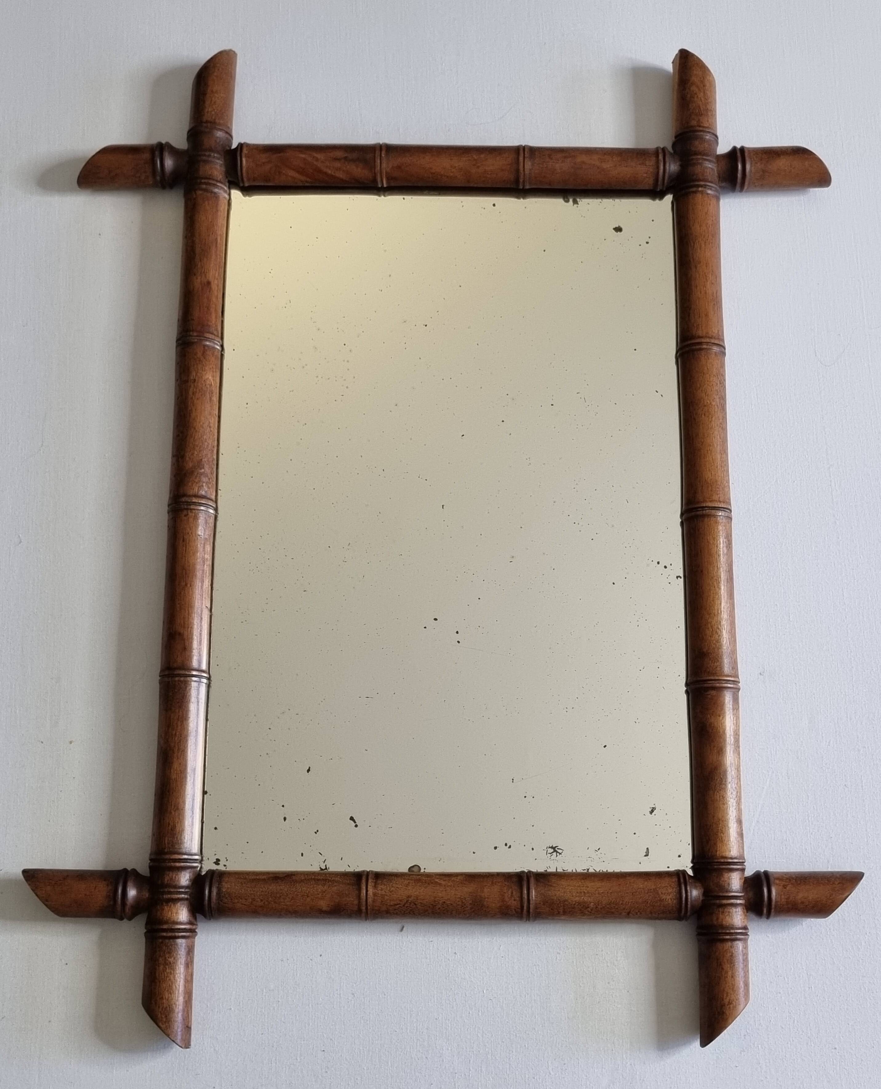 Miroir mural Napoléon III en bois tourné façon bambou XIXe siècle, 49x65 cm