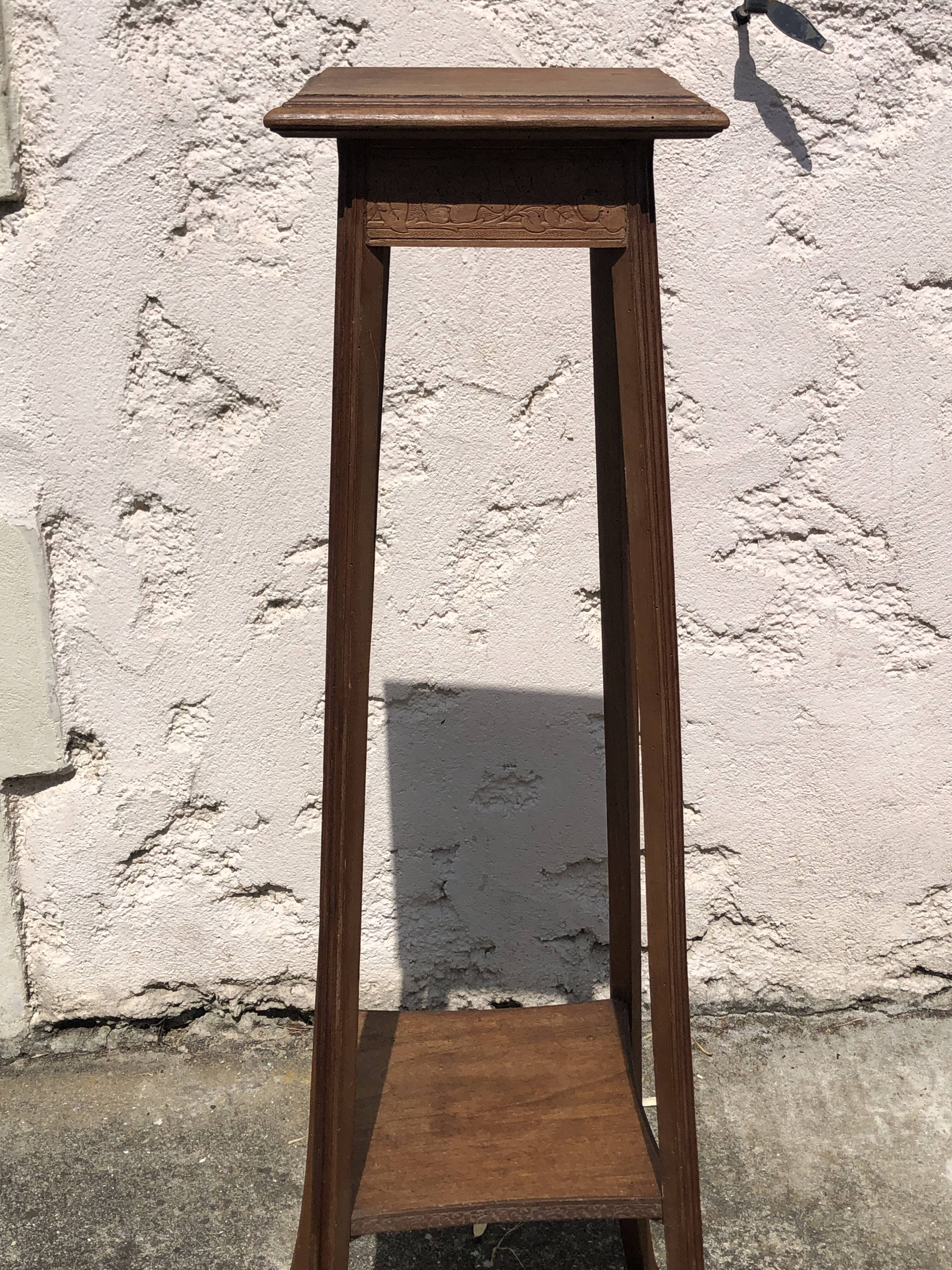 High harness in light wood, carved floral details