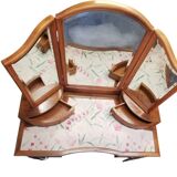 Dressing table with a triptych mirror