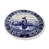 Round dish hollow Delfts decorating shepherdess and her sheep
