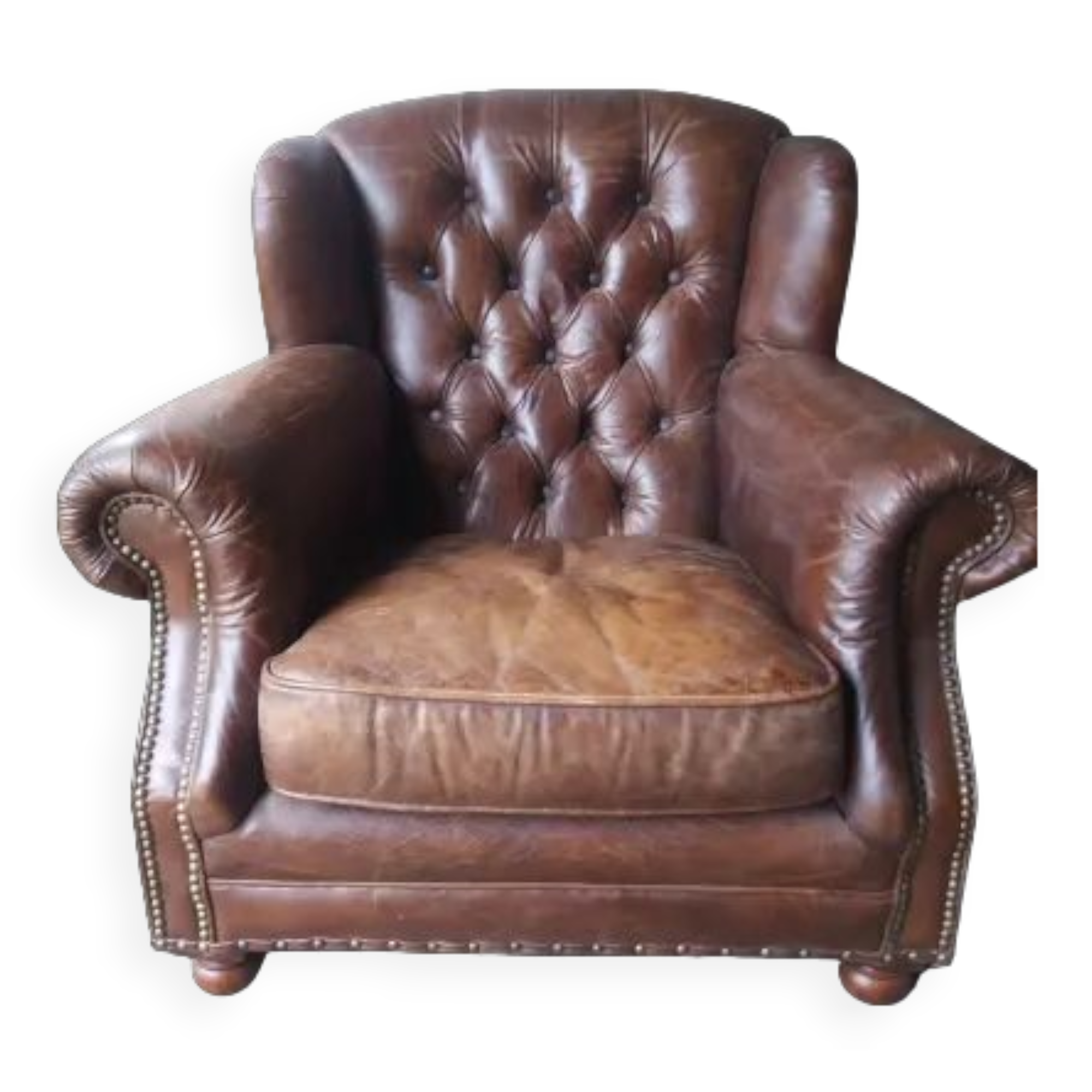 Fauteuil chesterfield à oreille cuir
