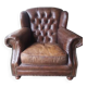 Fauteuil chesterfield à oreille cuir