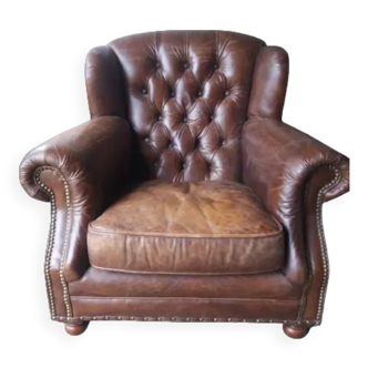 Fauteuil chesterfield à oreille cuir