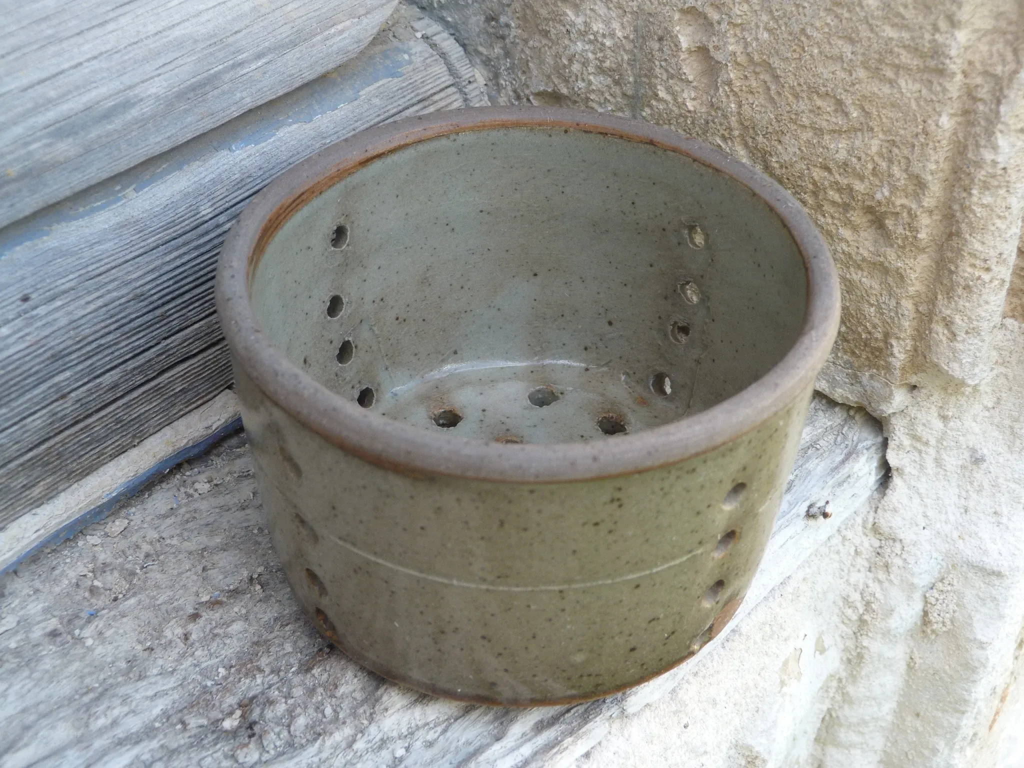 Old stoneware cheese drainer