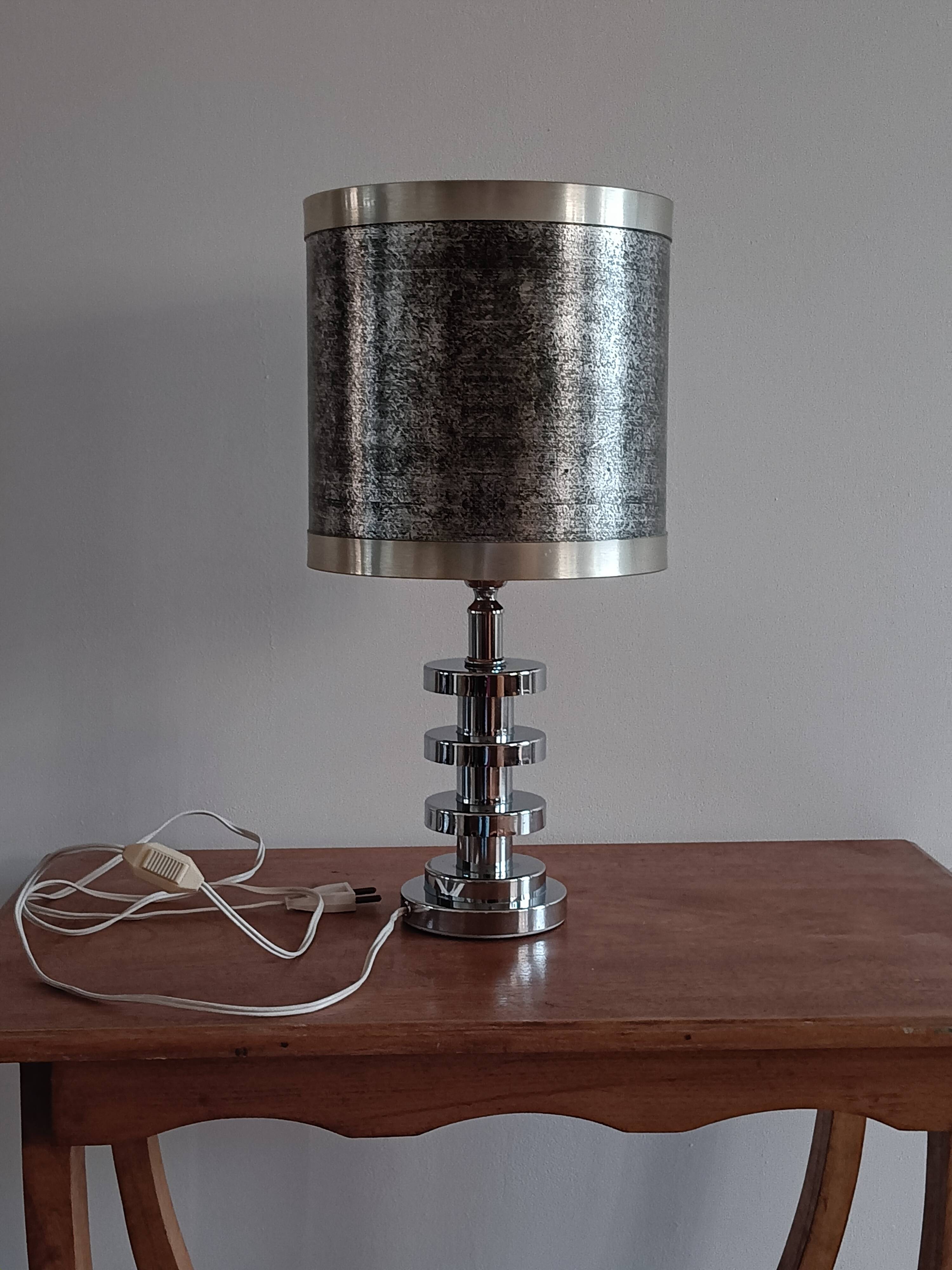 Chromed metal lamp and metallic paper lampshade. 70s